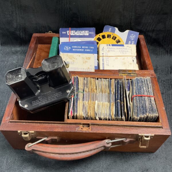 Vintage View-Master viewer and reels in wooden case.