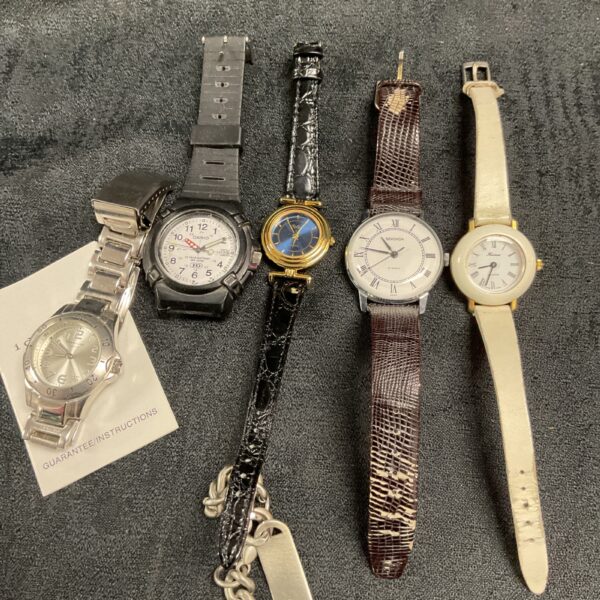 Tray of vintage wristwatches including Sekonda and a bracelet.