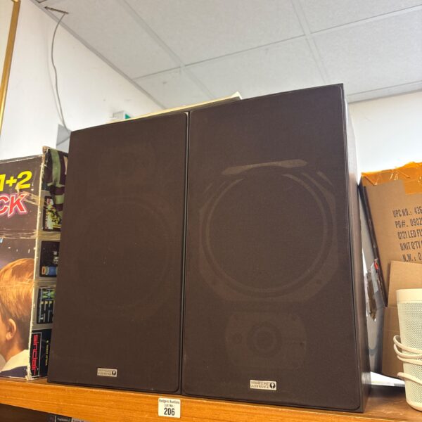 Vintage Wharfedale Laser 90B speakers in a retro setting.