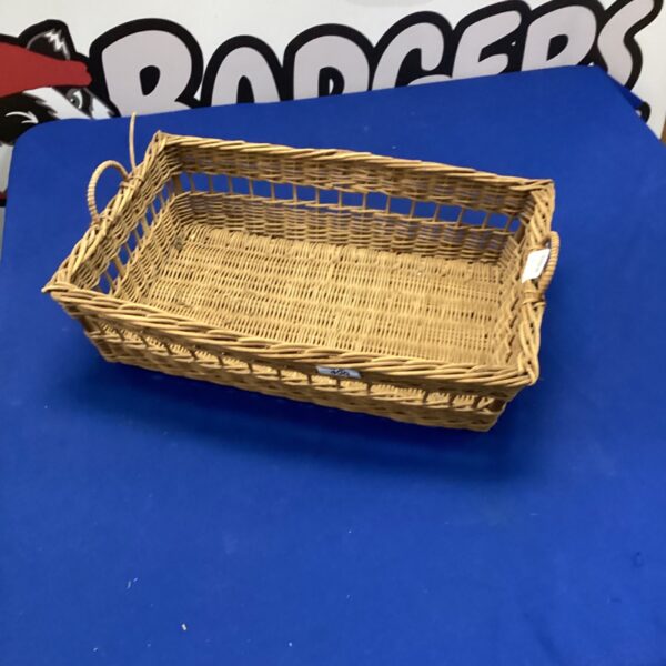 Vintage wicker basket for farmhouse storage and display.