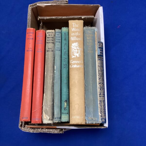 Vintage collection of Winnie the Pooh and classic children's books.