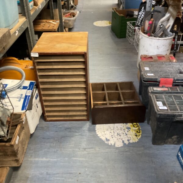 Vintage wooden storage boxes with dividers, rustic antique style.