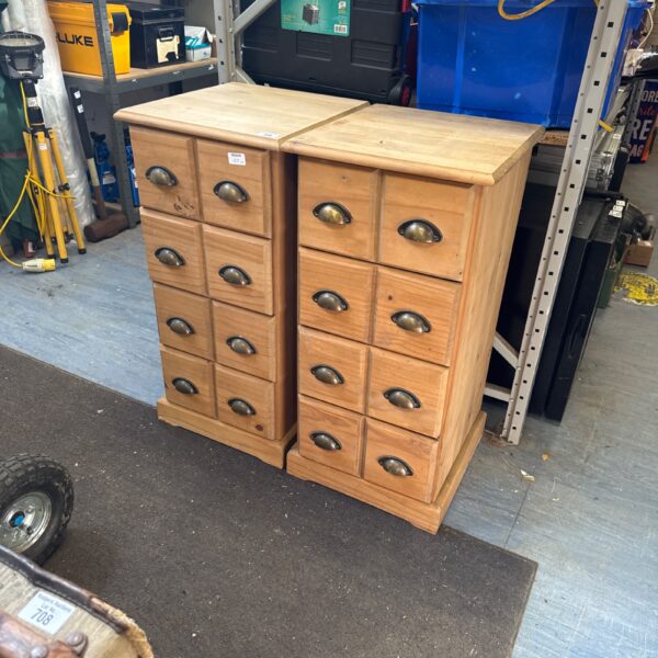 Vintage wooden storage drawer cabinet with multiple small drawers.