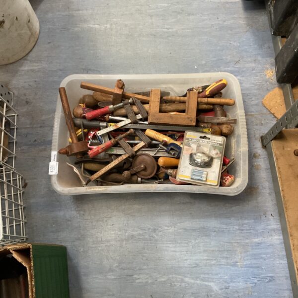 Vintage woodworking tools lot with clamps and gauges.