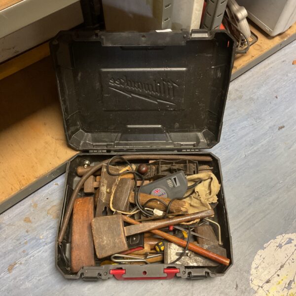 Vintage woodworking tools in a Milwaukee carrying case, antique carpentry set.