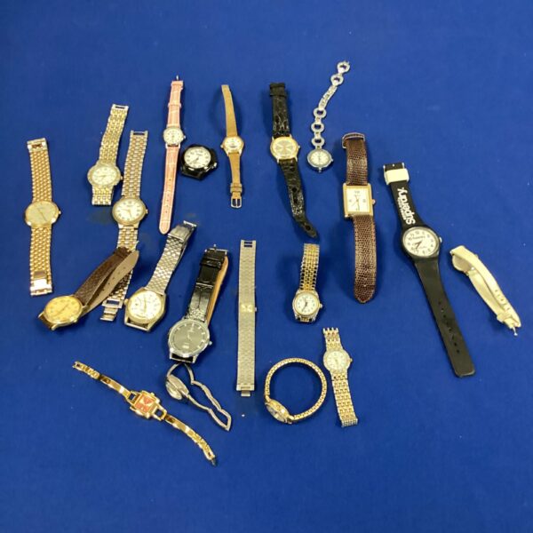 Vintage wrist watch bundle with various styles and brands.
