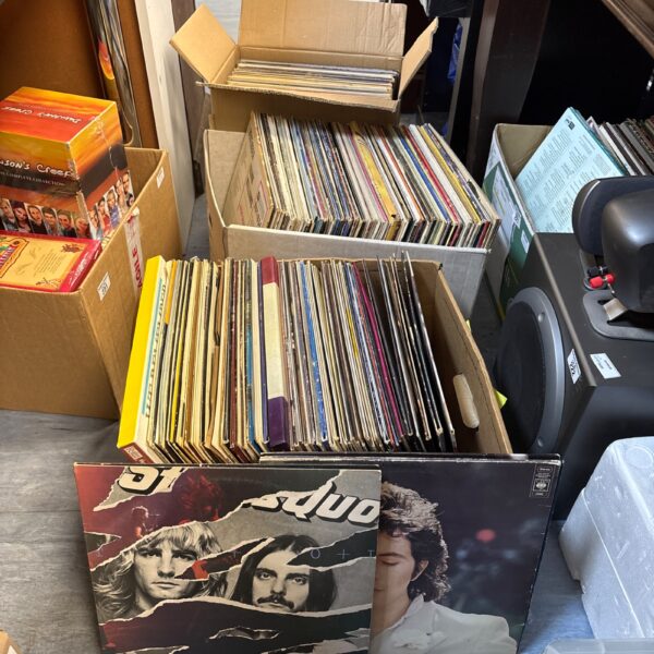 Lot of vintage vinyl records including Eric Clapton and Status Quo.