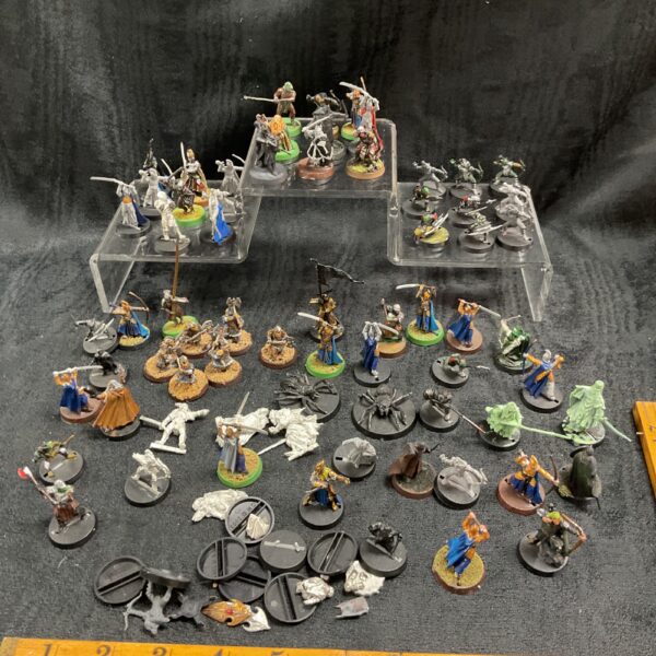 Large lot of Warhammer Lord of the Rings figures for tabletop gaming.
