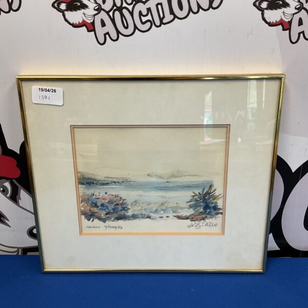 Tranquil watercolour coastal scene painting in a simple frame.