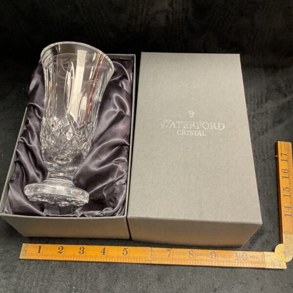 Boxed Waterford crystal vase with blue satin lining.