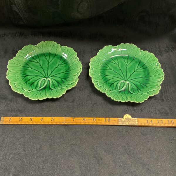 Pair of vintage Wedgewood majolica cabbage plates with green glaze.