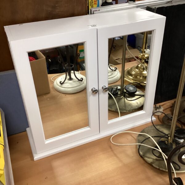 White mirrored bathroom cabinet with two doors, vintage style.