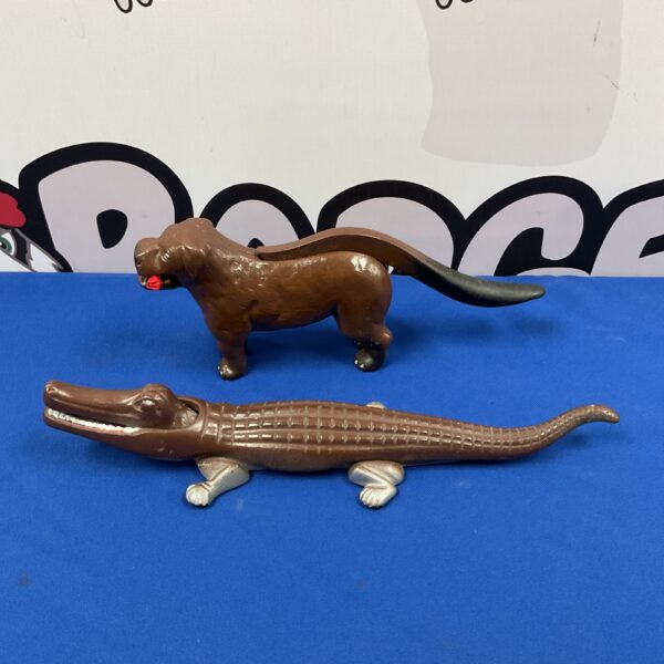Vintage Whymans Warrington cast iron dog and crocodile nutcrackers.