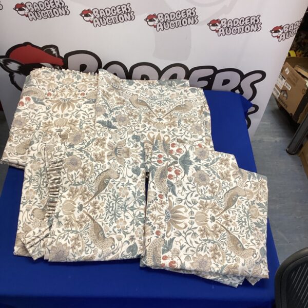 Vintage William Morris curtains with a floral pattern.