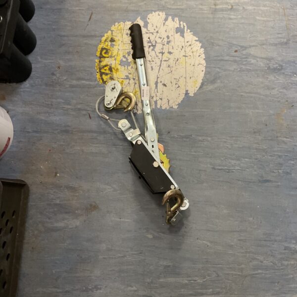Vintage wire rope puller tool for cable tensioning.