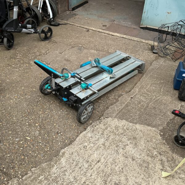 Portable Wolfcraft folding workbench for DIY projects and storage.