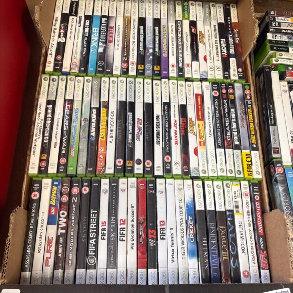 Tray of mixed Xbox 360 video games for collectors.