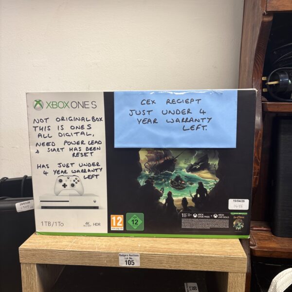 Front view of boxed Xbox One S gaming console.