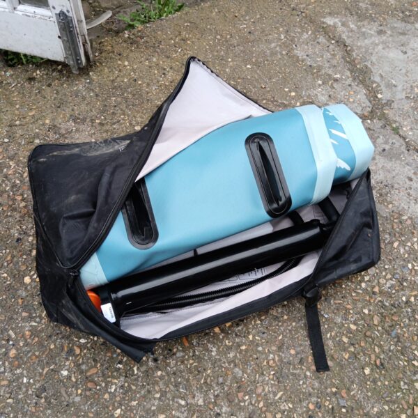XQ Max inflatable paddle board set inside a carry bag.