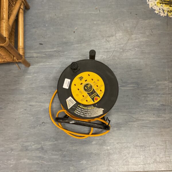 Yellow extension cable reel, model 8530, for garden and workshop use.