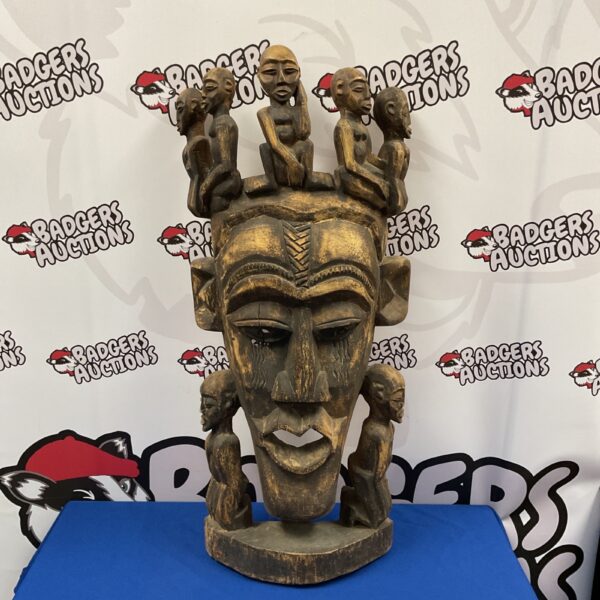 Front view of a large wooden Yoruba ceremonial mask.