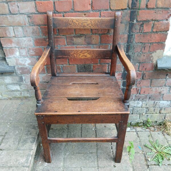 Antique oak commode arm chair
