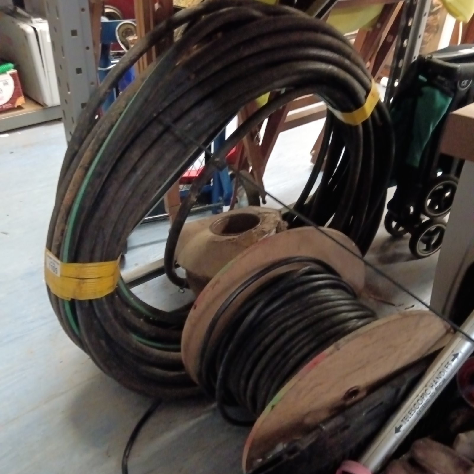Roll of airline hose with 2 rolls of five core cable