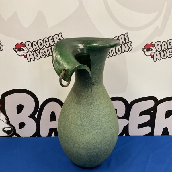 Green 1980s post-modern pottery vase with unique sculptural form.