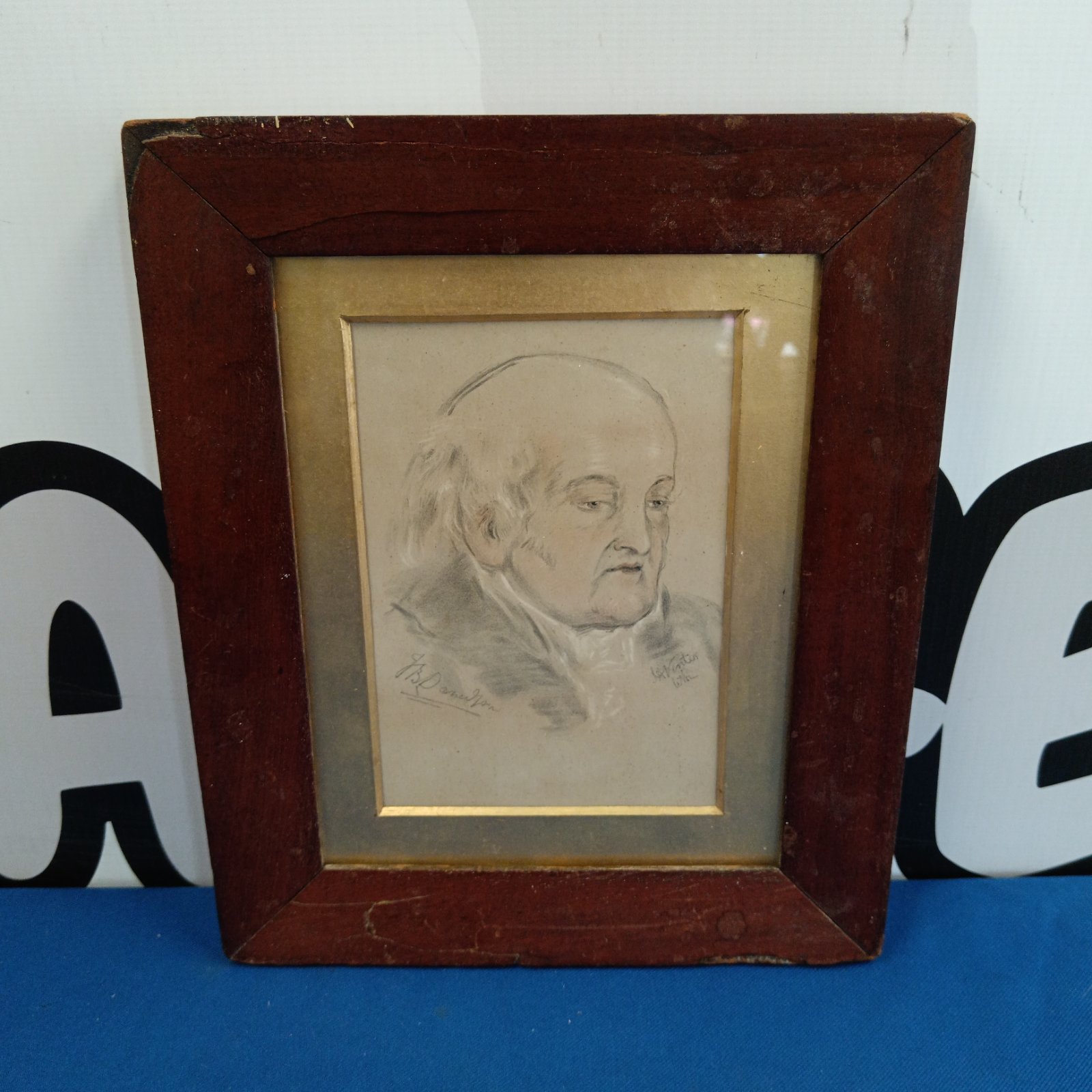 Antique 19th-century sanguine and pastel portrait of a gentleman.