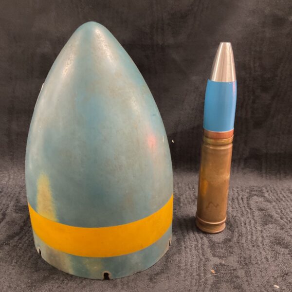 Blue and yellow 30mm Aden cannon practice round nose cone.