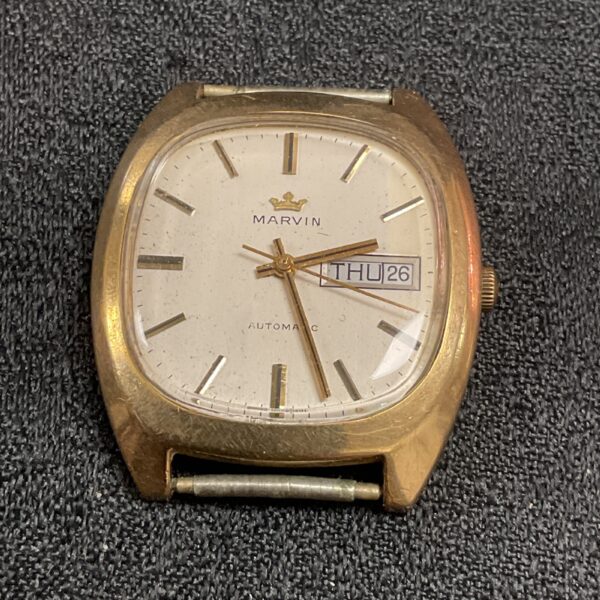 Vintage 9ct gold Marvin automatic wristwatch with date display.