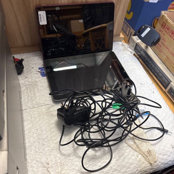 Pair of Acer Iconia tablets with chargers for auction.