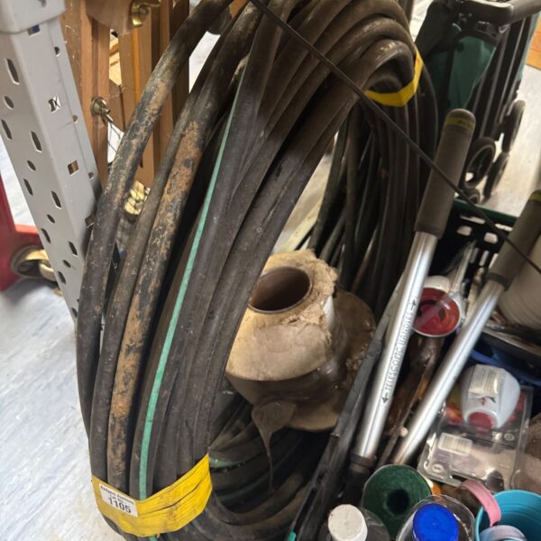 Roll of airline hose and five core cable for workshop use.