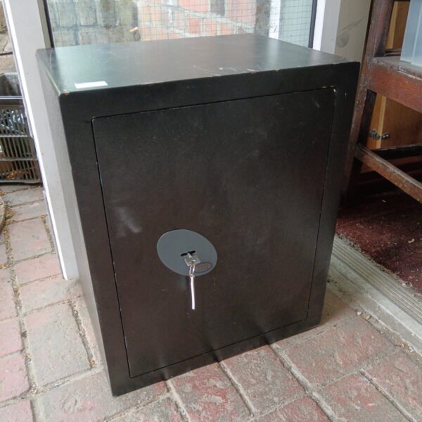Vintage Alfa safe with key, secure metal storage solution.
