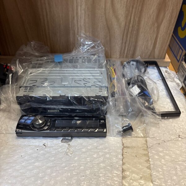 Alpine CDA-9847R car radio head unit with cables.