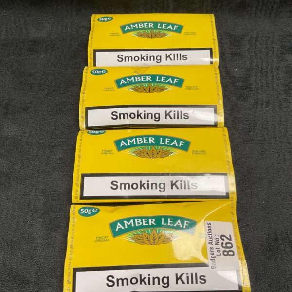 Sealed packs of Amber Leaf rolling tobacco for sale.