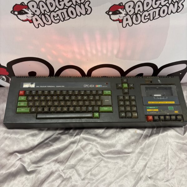 Front view of a vintage Amstrad CPC 464 computer.