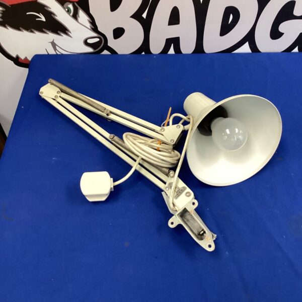 Vintage Anglepoise desk lamp with adjustable arm and conical shade.