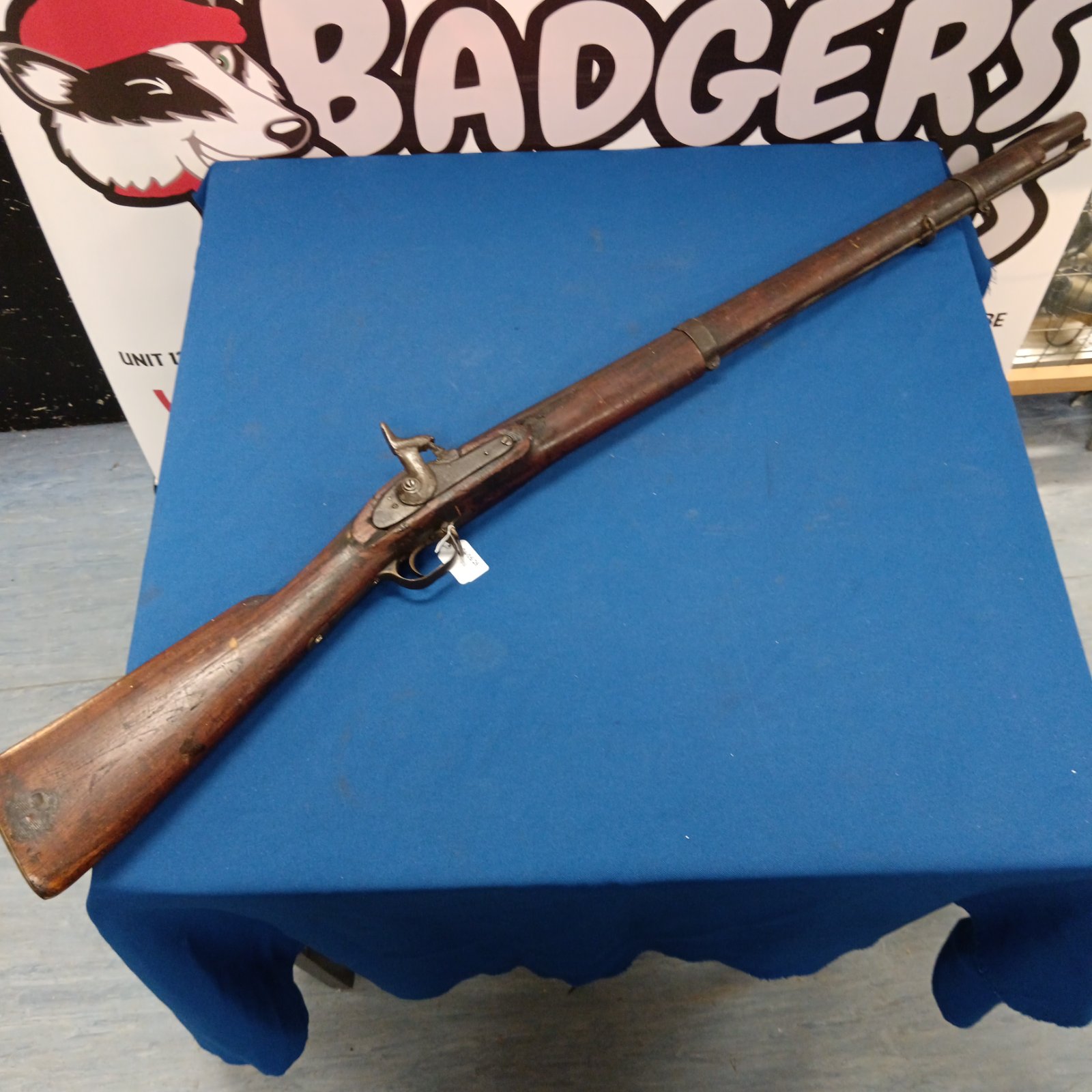 Antique 1886 musket rifle with wooden stock.
