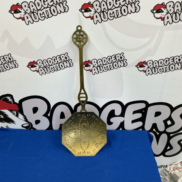 Antique brass chestnut roasting spoon with pierced bowl.