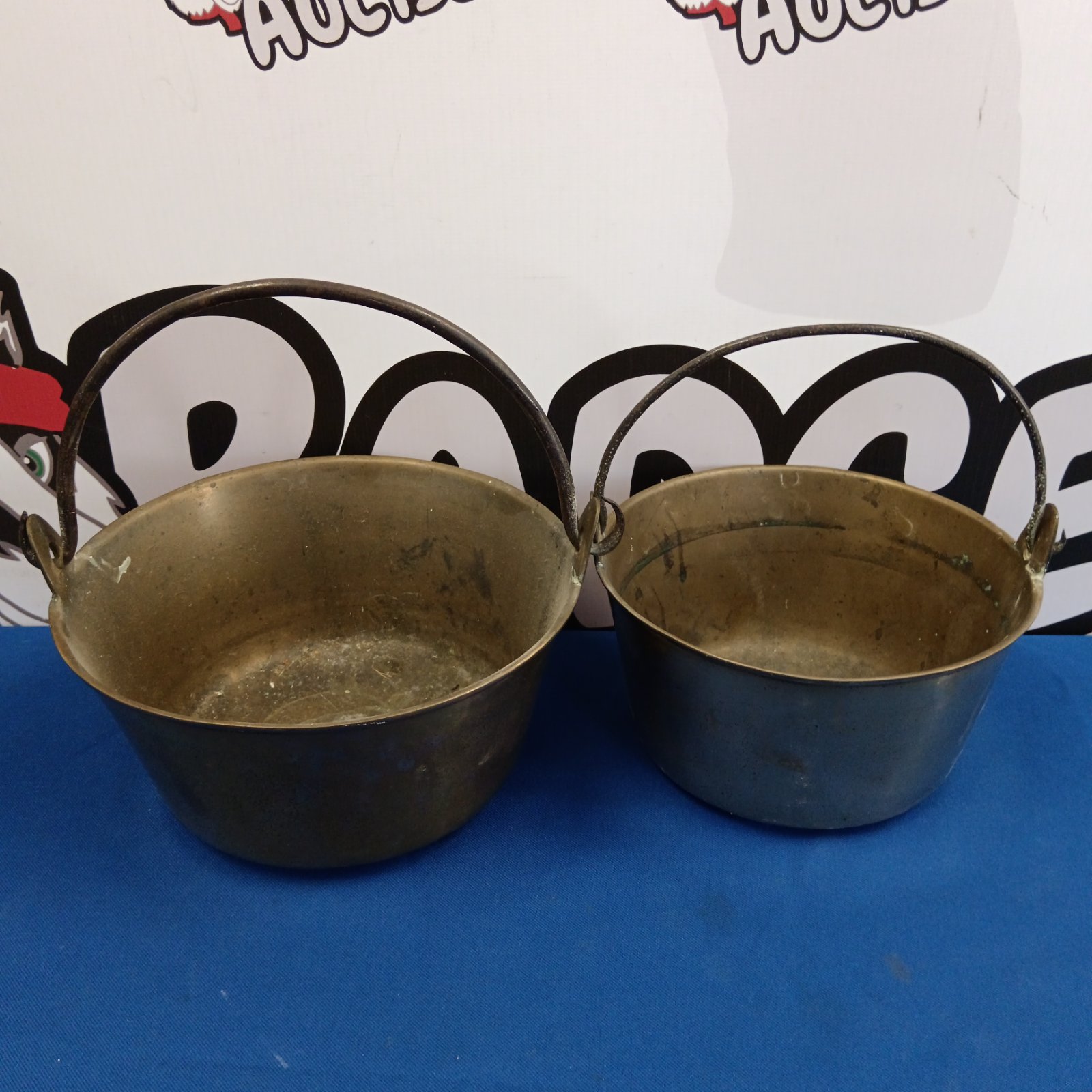 Two antique brass jam pans with handles, vintage kitchenalia.