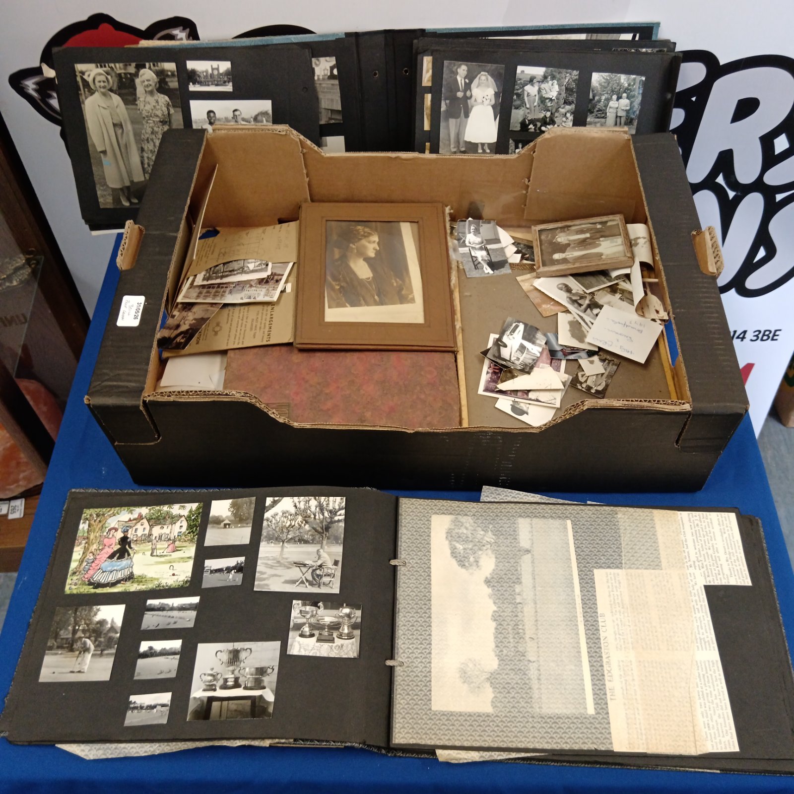 Antique photograph collection in an album, vintage photos and portraits.