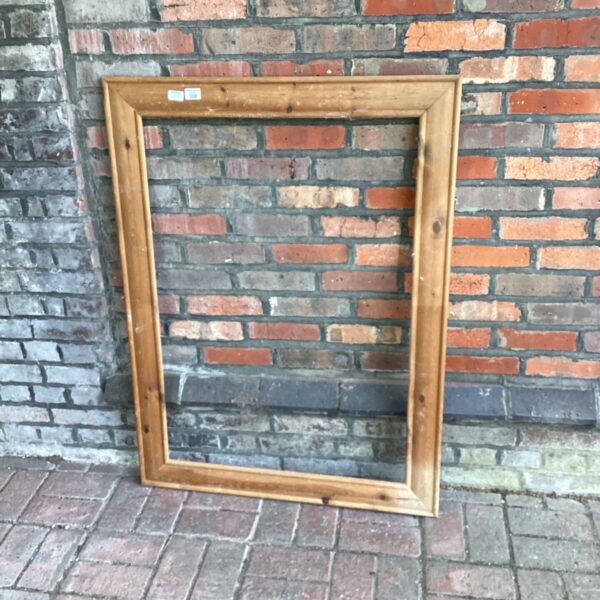 Antique point frame measuring 35x47 inches with gilded detailing.