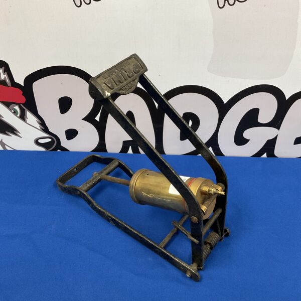 Antique Prima foot pump with brass cylinder and iron base.
