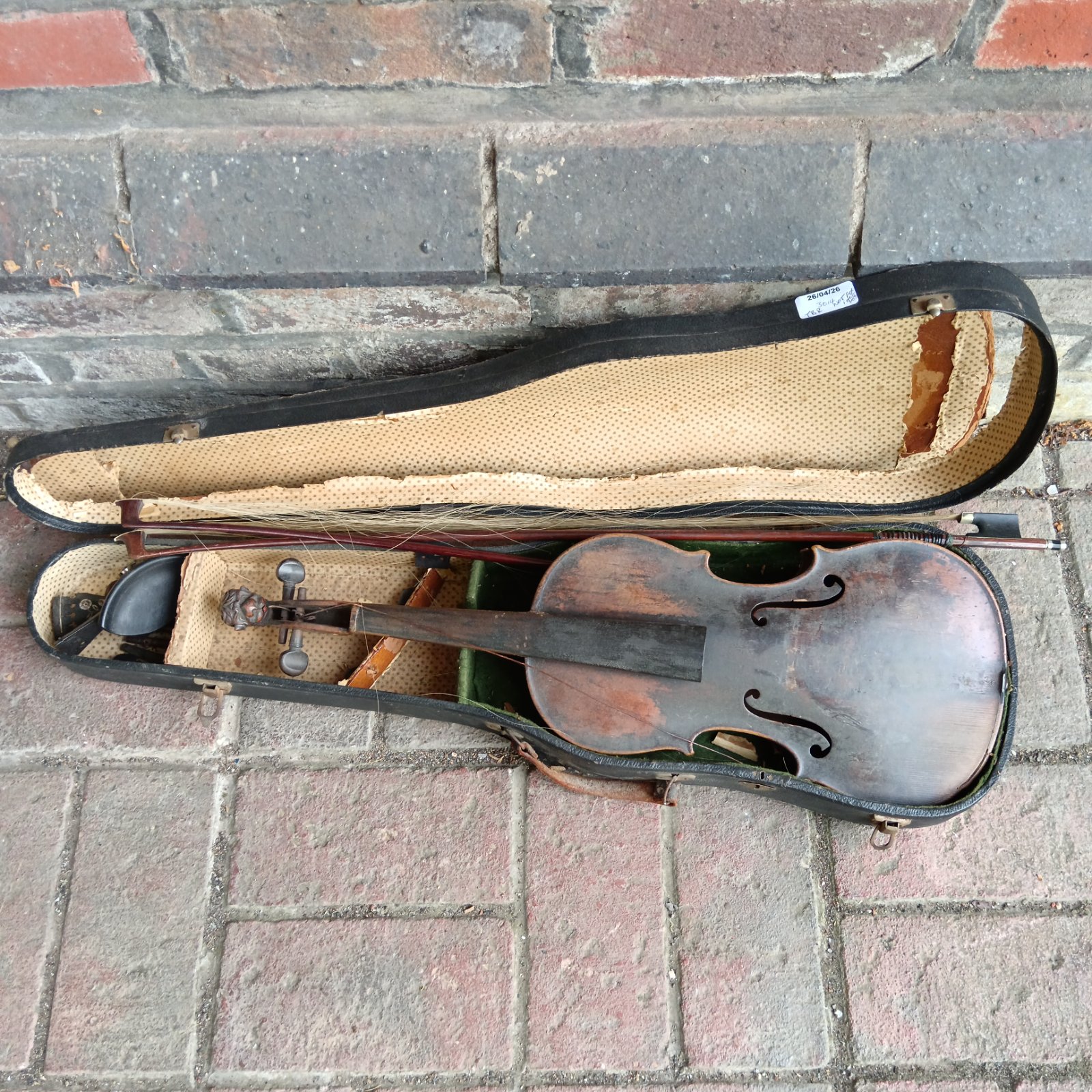 Antique Tielke violin in open case, awaiting restoration.