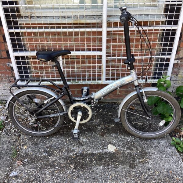 Side view of an Apollo Transition folding bike.