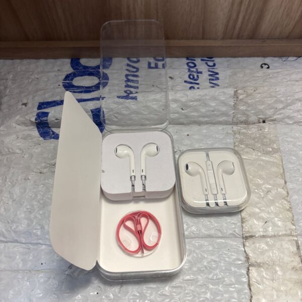 White Apple iPod headphones, original earphones for portable music players.
