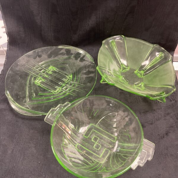 Vintage Art Deco green glass vases with fan-shaped design.