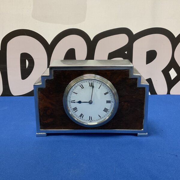 Vintage Art Deco mantle clock with chrome case.