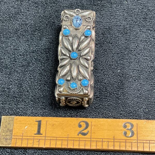 Art Nouveau silver lipstick mirror with turquoise stones.